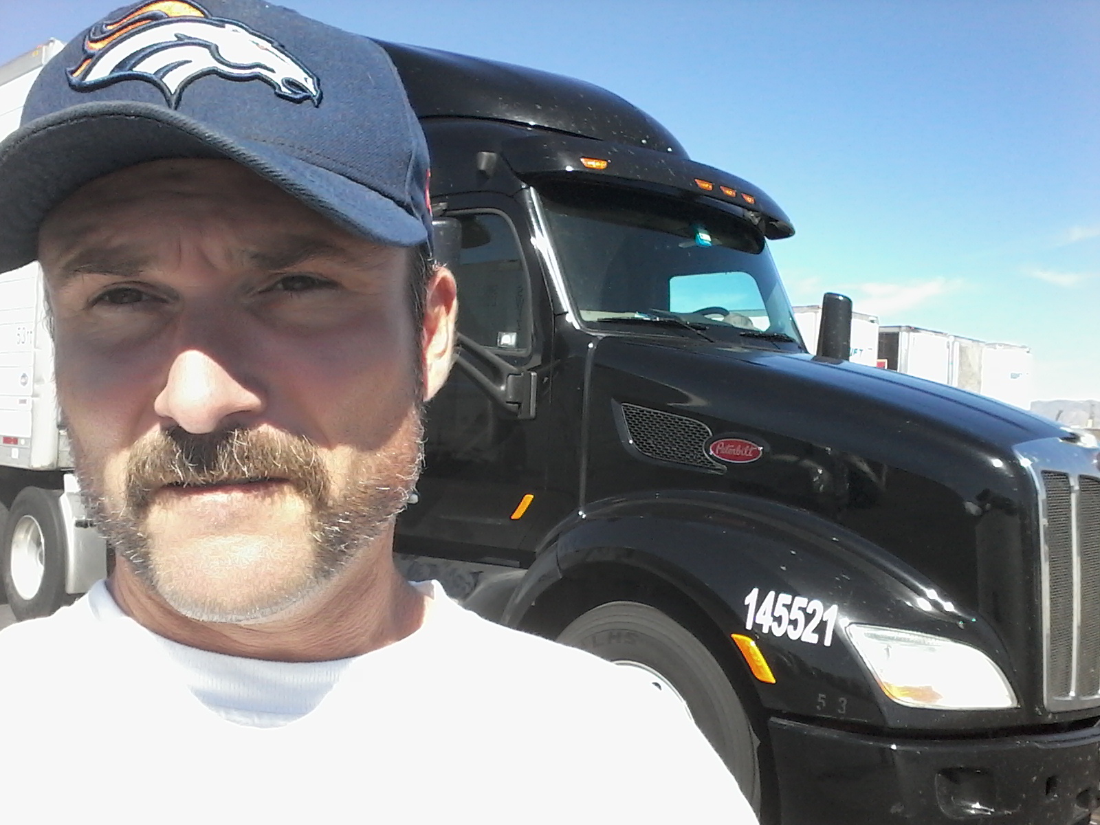 Stephen McDougle in front of his truck